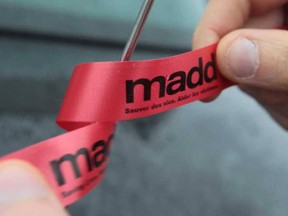 A MADD Canada ribbon is pictured during its red ribbon campaign promoting sober driving in this file photo