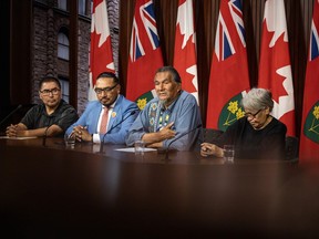 Members of the Land Defence Alliance, left to right, Chief Rudy Turtle of Grassy Narrows First Nation, Sol Mamakwa MPP, Elder Alex Moonias from Neskantaga First Nation and Cecilia Begg from Kitchenuhmaykoosib Inninuwug First Nation hold a press conference at Queen's Park in Toronto on Tuesday, September 26, 2023.