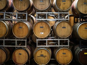 Ontario winemakers have long raised concerns about the province's tax regime. Barrels of wine are shown in the cellar at Southbrook Organic Vineyards in Niagara-on-the-Lake, Ont., Sept. 1, 2022.