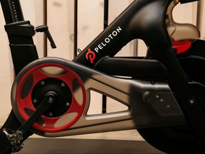 A Peloton stationary bike sits on display at one of the fitness company's studios on Dec. 4, 2019 in New York City.