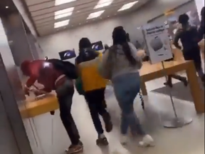 A screenshot from video posted to social media of looting at an Apple store in Philadelphia.