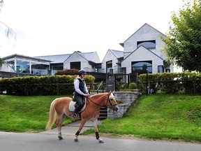 Byron Stanley put the blame on his realtor’s negligence, for what he said was overpricing of $13.8 million of the four-acre property with equestrian stables and paddocks in one of the most exclusive areas of Vancouver. A 7,000 sq-ft home has since been built on the property, pictured here.