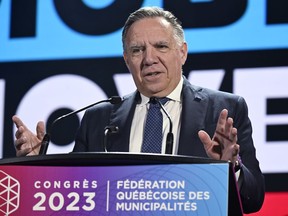 The Quebec government intends to table a bill in the coming days to enable it to join a class action lawsuit brought by British Columbia against more than 40 pharmaceutical companies accused of downplaying the harmful effects of opioids. Quebec Premier Francois Legault speaks to members of the Federation Quebecois des Municipalites at their annual meeting in Quebec City, Friday, Sept. 29, 2023.