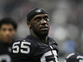 FILE - Las Vegas Raiders defensive end Chandler Jones (55) warms up before an NFL football game against the New England Patriots, Monday, Dec. 19, 2022, in Las Vegas. Las Vegas Raiders defensive end Chandler Jones indicated in since-deleted social media posts on Tuesday, Sept. 5, 2023, that he no longer wanted to play for coach Josh McDaniels and general manager David Ziegler.