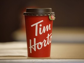 Restaurant Brands International Inc. has received approval from its board of directors to repurchase up to US$1 billion of its common shares over the next two years. A Tim Hortons cup is seen inside a Tim Hortons restaurant in Toronto, Friday, March 6, 2020.