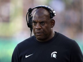 Michigan State coach Mel Tucker walks the sideline during the second half of an NCAA college football game against Richmond, Saturday, Sept. 9, 2023, in East Lansing, Mich. Michigan State won 45-14.