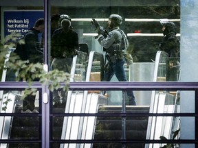 Dutch special intervention police officers secure the Erasmus University Medical Center (Erasmus MC) in Rotterdam on Sept. 28, 2023, which was cordoned off after two reported shooting incidents.