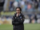 Montreal Impact coach Mauro Biello watches his team from the sideline during an MLS soccer match against the Philadelphia Union on Saturday, April 22, 2017, in Chester, Pa.