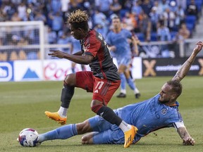 New York City FC's defender Maxime Chanot, right, vies for the ball against Toronto FC midfielder Latif Blessing during a Leagues Cup match, Wednesday, July 26, 2023, in Harrison, N.J.
