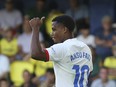 Barcelona's Ansu Fati gestures during a Spanish La Liga soccer match between Villarreal and Barcelona at the Ceramica stadium in Villarreal, Spain, Sunday, Aug. 27, 2023.