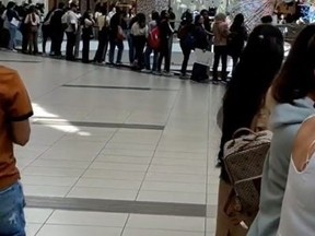 Line for Bath and Body Works job fair at Scarborough Town Centre.
