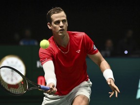 Canada's Vasek Pospisil in action against Sweden's Leo Borg during their Davis Cup group stage tennis match at the Unipol Arena, Bologna, Italy, Thursday, Sept. 14. 2023.