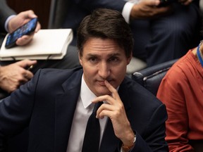 Prime Minister Justin Trudeau says Canada will be able to exceed its targets for reducing methane emissions from the oil and gas sector. Trudeau listens to a speaker as he participates in the United Nations Secretary General's Climate Ambition Summit at the United Nations, in New York, Wednesday, Sept. 20, 2023.