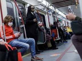 Riders take a TTC subway Saturday, April 1, 2023.