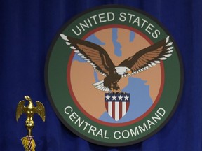 FILE - The seal for the U.S. Central Command is displayed on Feb. 6, 2017, at MacDill Air Force Base, Fla. The U.S. military says it has captured an operator for the Islamic State extremist group during a helicopter raid in northern Syria. U.S. Central Command said in a statement Monday, Sept. 25, 2023, that the operator, Abu Halil al-Fad'ani, "was assessed to have relationships throughout the ISIS network in the region." It says his capture on Saturday increases the chance that U.S. counterterrorism operations there will be able to target additional members of the group.