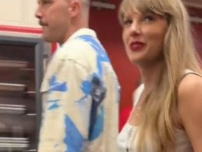 Chiefs star Travis Kelce and pop star Taylor Swift are seen together after Sunday's Chiefs-Browns game in Kansas City.