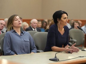 Kouri Richins, left, a Utah mother of three who authorities say fatally poisoned her husband, Eric Richins, then wrote a children's book about grieving, listens as her attorney Skye Lazaro speaks during a status hearing Friday, Sept. 1, 2023, in Park City, Utah.