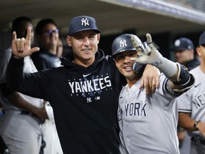 New York Yankees' Gleyber Torres, right, celebrates his home run with Anthony Rizzo, left, in the seventh inning of a baseball game against the Detroit Tigers, Monday, Aug. 28, 2023, in Detroit.