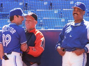 Paul Molitor of the Toronto Blue Jays speaks with Detroit Tigers manager Sparky Anderson and Blue Jays manager Cito Gaston.