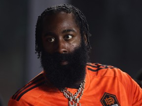 James Harden of the Philadelphia 76ers watches the match between Inter Miami and the Houston Dynamo during the 2023 U.S. Open Cup.
