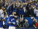 Blue Jays' Jose Bautista tosses his bat after hitting a crucial home run against the Texas Rangers in 2015.