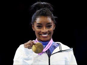 Gold medalist Simone Biles of Team United States poses for a photo.