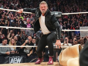 Adam Copeland in the ring during an AEW event.