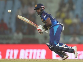 Charith Asalanka of Sri Lanka plays a shot during the ICC Men's Cricket World Cup.