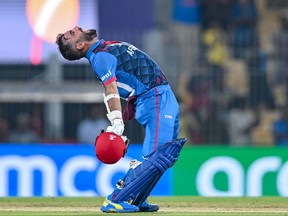 Afghanistan's captain Hashmatullah Shahidi celebrates after winning the 2023 ICC Men's Cricket World Cup one-day international (ODI) match between Pakistan and Afghanistan.