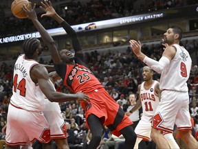 Toronto Raptors forward Chris Boucher (25) grabs a rebound against Chicago Bulls during a pre-season game.