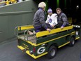 Minnesota Vikings quarterback Kirk Cousins is carted off the field after sustaining an injury.