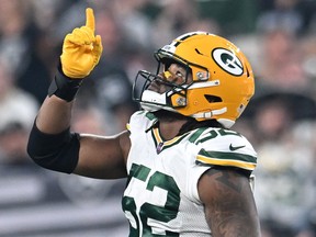 Rashan Gary of the Green Bay Packers celebrates after a sack during the second half against the Las Vegas Raiders.
