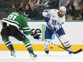 TJ Brodie of the Toronto Maple Leafs passes the puck.