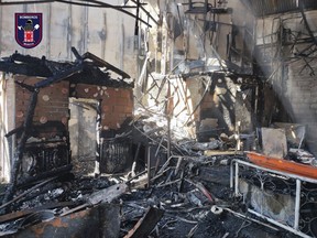 In this photo provided by Bomberos/ayuntamiento de Murcia, part of the burned-out interior a nightclub which caught fire is pictured in Murcia, south-eastern Spain, Sunday Oct. 1, 2023. (Bomberos/ayuntamiento de Murcia, via AP)