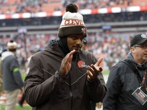 Injured Cleveland Browns quarterback Deshaun Watson applauds as he walks off the field after an NFL football game against the San Francisco 49ers Sunday, Oct. 15, 2023, in Cleveland.