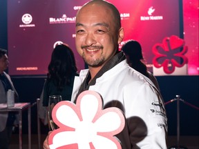 Chef Takeshi Sato celebrates being awarded a Michelin star.