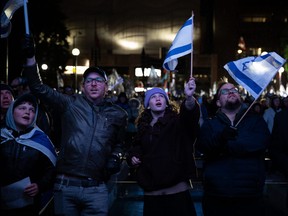 People attend a rally in support of Israel.