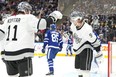 Los Angeles Kings' Adrian Kempe (right) celebrates after scoring against the Toronto Maple Leafs during third period NHL hockey action in Toronto, on Tuesday, October 31, 2023.