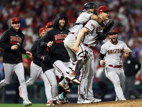 Paul Sewald of the Arizona Diamondbacks celebrates