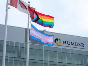 Flags fly in front of Humber College.