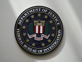 An FBI seal is seen on a wall on Aug. 10, 2022, in Omaha, Neb.