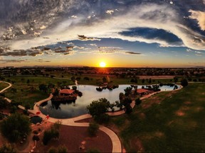 Aerial panoramic image of a sunset over Discovery Park in Gilbert, Arizona.