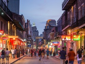 Pubs and bars with neon lights in the French Quarter, downtown New Orleans.