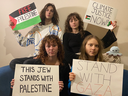 Climate activist Greta Thunberg (front, right) is pictured with other activist in this photo, which was posted to social media. She has removed this picture from her social media accounts, citing concerns it was unknowingly hurtful toward Jewish people. In a new post, the sign remained. 