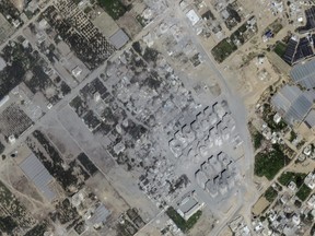 This image provided by Maxar Technologies shows after significant damage to buildings and structures in Atatra, northern Gaza, on Oct. 21, 2023.