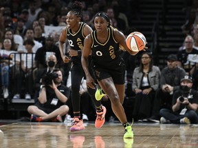 In this Sept. 24, 2023 file photo, Jackie Young of the Las Vegas Aces dribbles the ball against the Dallas Wings during the third quarter of Game 1 of the 2023 WNBA Playoffs semifinals at Michelob ULTRA Arena in Las Vegas, Nevada.