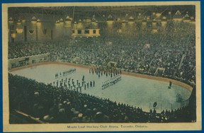 The 48th Highlanders play to a capacity crowd in 1931 as the Maple Leafs await the faceoff in the newly constructed Gardens.