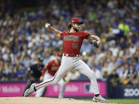 Zac Gallen of the Arizona Diamondbacks delivers during the first inning against the Milwaukee Brewers