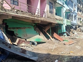 A general view shows damaged building