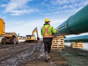 A Trans Mountain Pipeline worker is pictured in this file photo
